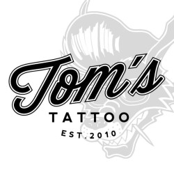 TOM'S TATTOO